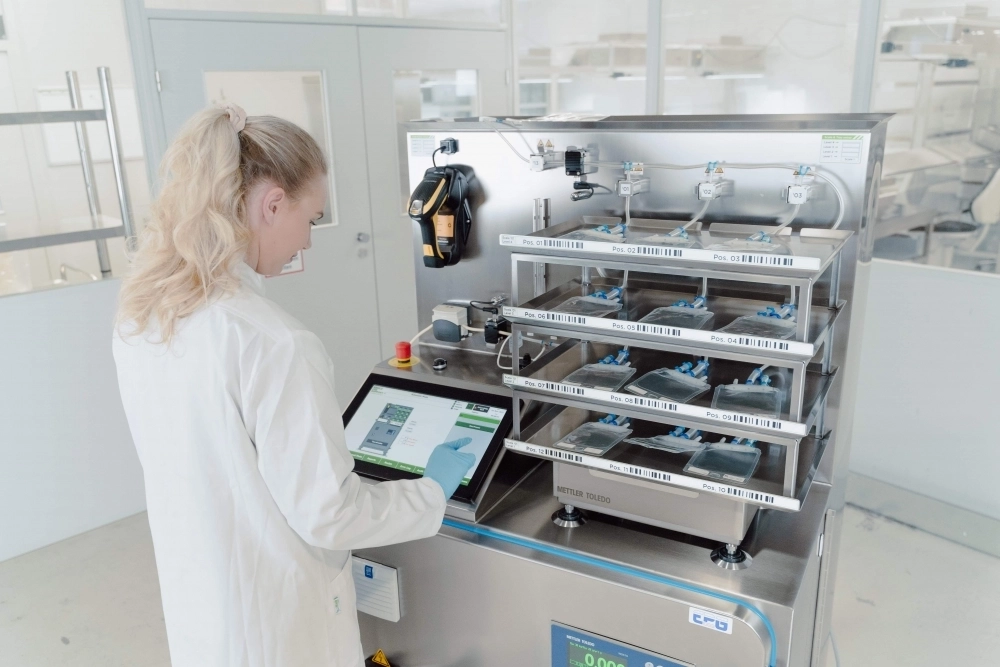 Medical laboratory technician running diagnostic tests