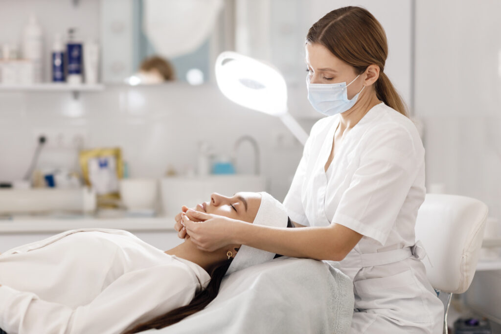 Aesthetic Clinics FBR POS Integration - cosmetology doctor with patient